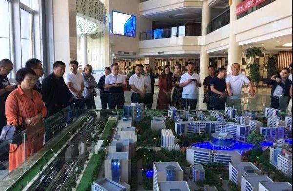 甘肃省五县区工商联会员企业家参观考察新区“pg电子官方三厂”及“pg电子官方世贸广场”项目